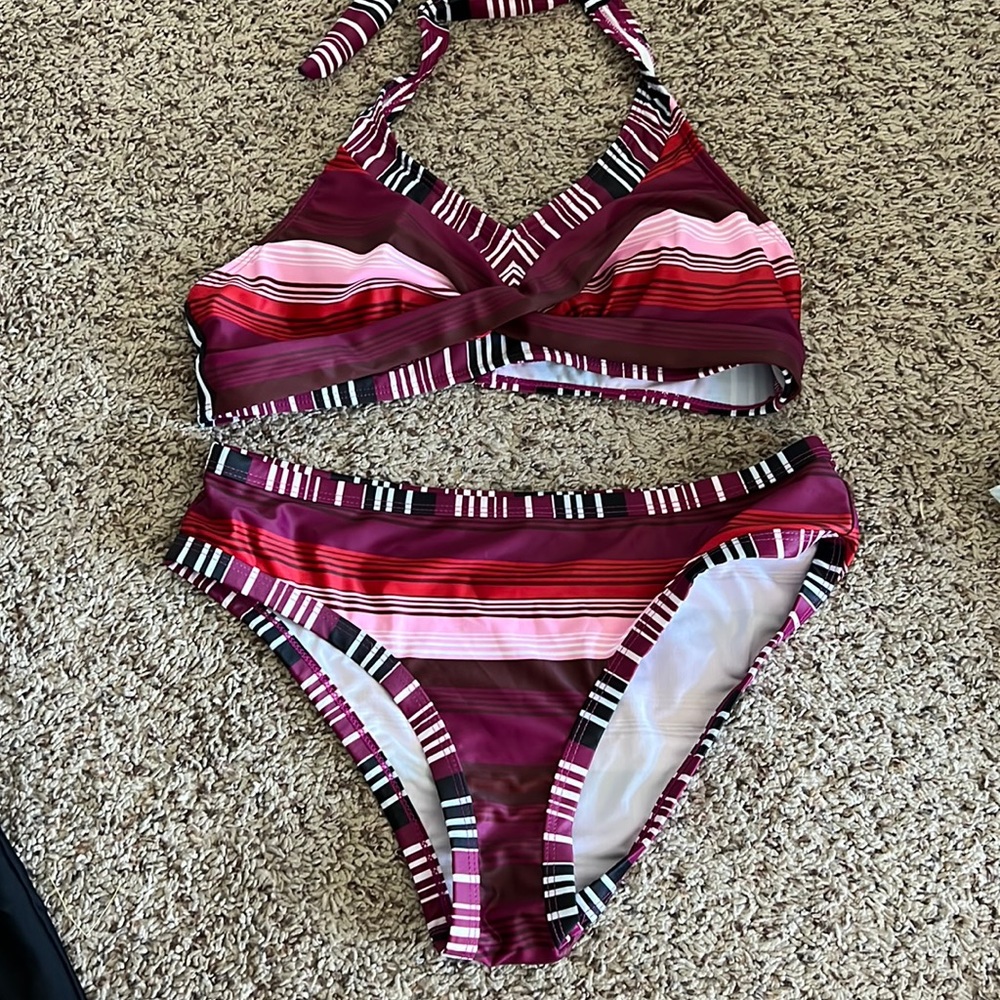 Size M striped bikini with cross bust, halter tie at neck